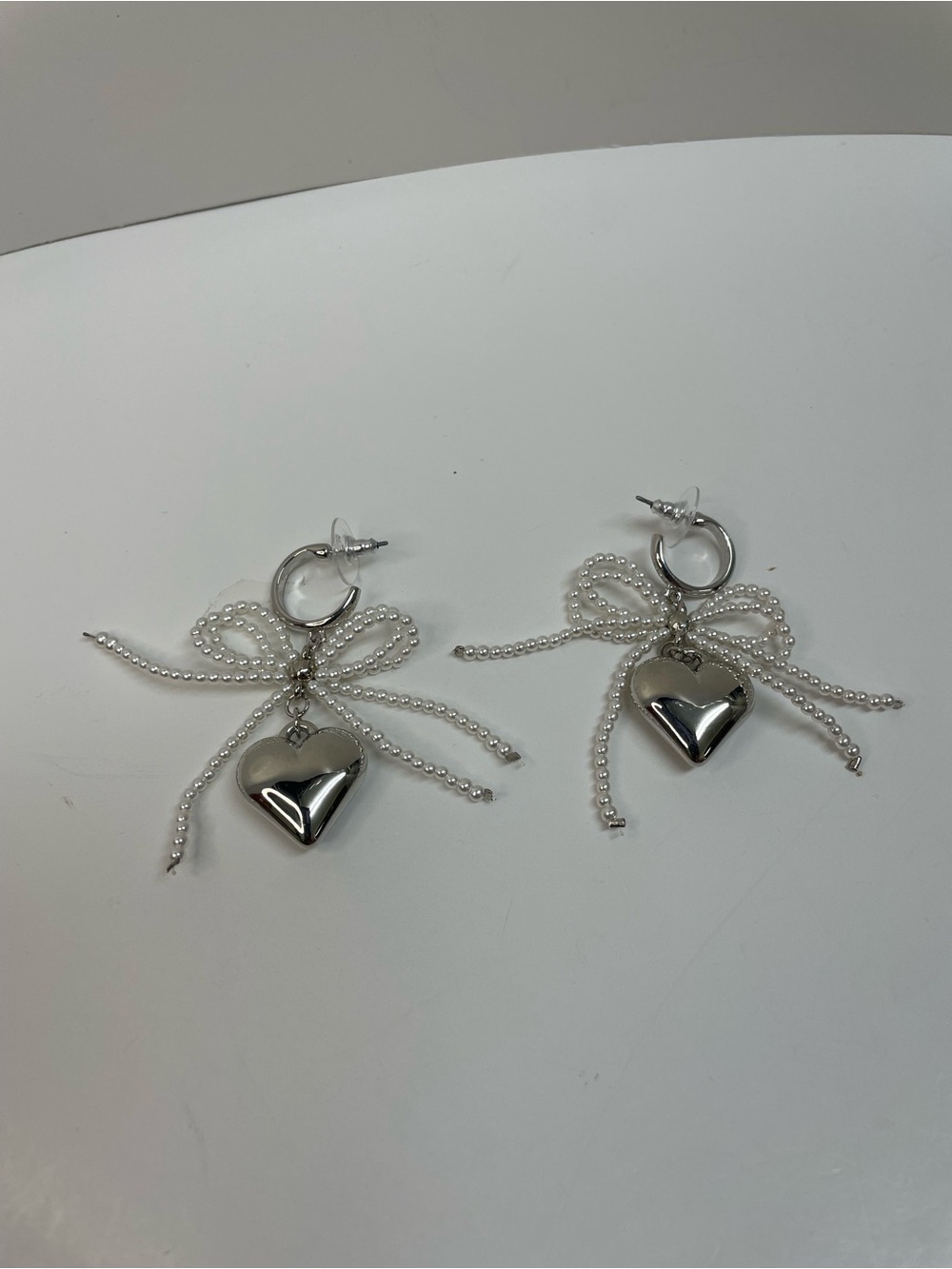 Silver Bow Earrings with Heart Drops